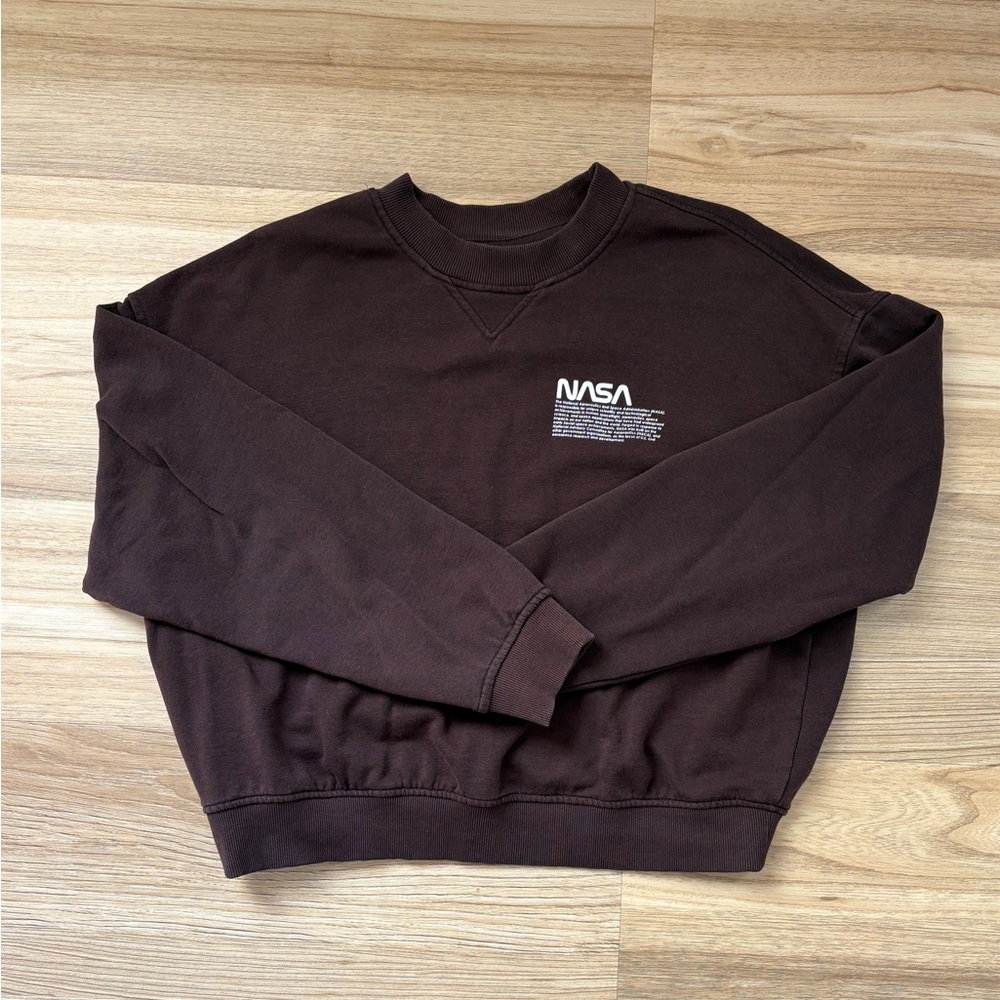 Brown woman’s sweater